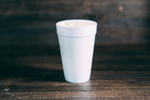 A white disposable styrofoam cup