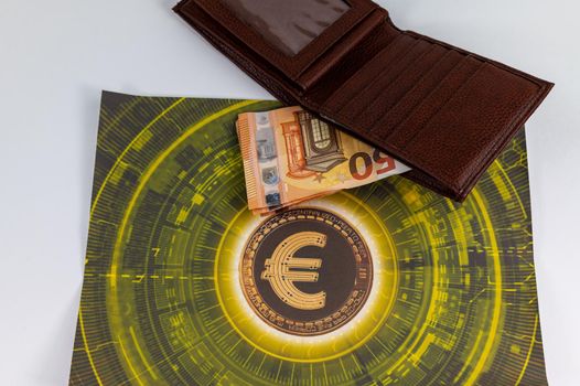 50 euro bills with currency symbol and wallet on the table