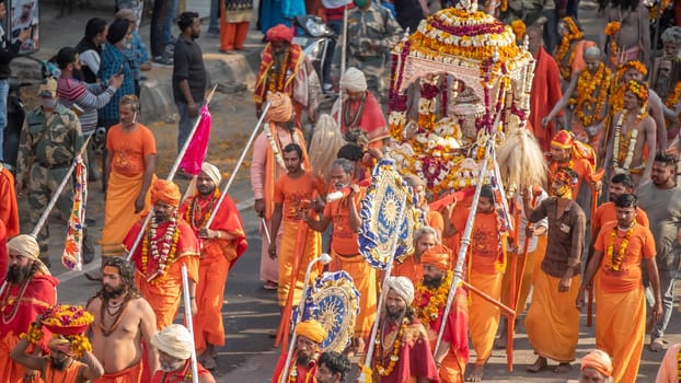 Haridwar, Uttarakhand. India- March 5, 2021- Indian sadhus coming to Kumbh Mela, Royal welcome. Sadhus sitting in rides, wearing a garland, Appleprores 422 Cinetone. High-quality 4k footage