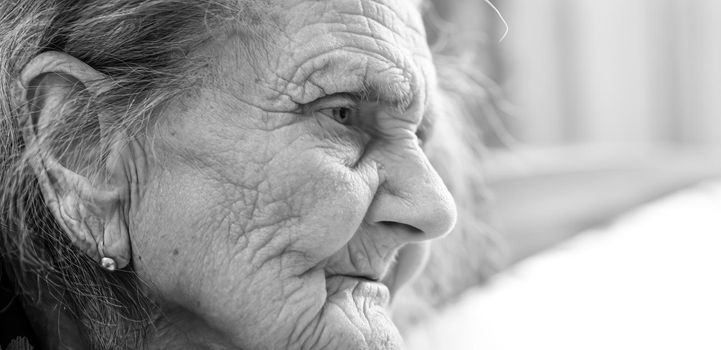 Old woman. Portrait of very old tired woman in depression. Black and white image