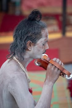 Haridwar, Uttarakhand, India April 12, 2021. Indian Saints in their traditional way of Yog Mudra, meditating. Sitting in silence as part of the initiation of new sadhus during Kumbha Mela. The Naga Sadhus.