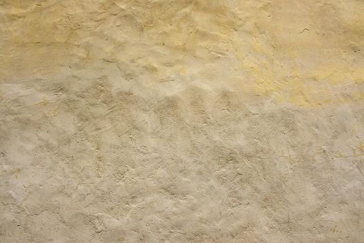 Beige wall background, plaster rough texture