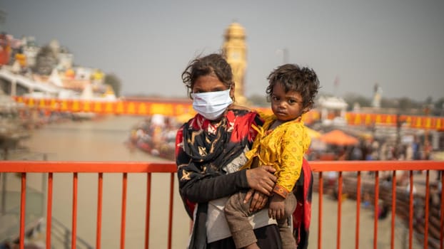 Haridwar, Uttarakhand India April 06, 2021. Indian children wearing protection mask to stay safe from Coronavirus during Maha Kumbh 2021 High-quality