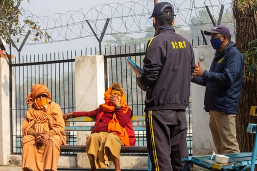 Haridwar, Uttarakhand India April 06, 2021. Policemen spreading awareness of protection from Coronavirus to stay safe from Coronavirus during Maha Kumbh 2021. Apple prores 422 High-quality 4k footage.