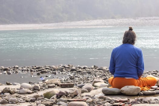 Haridwar, Uttarakhand, India April 12, 2021. Indian Saints in their traditional way of Yog Mudra, meditating. Sitting in silence as part of the initiation of new sadhus during Kumbha Mela. The Naga Sadhus. Apple prores 422 High-quality 4k footage