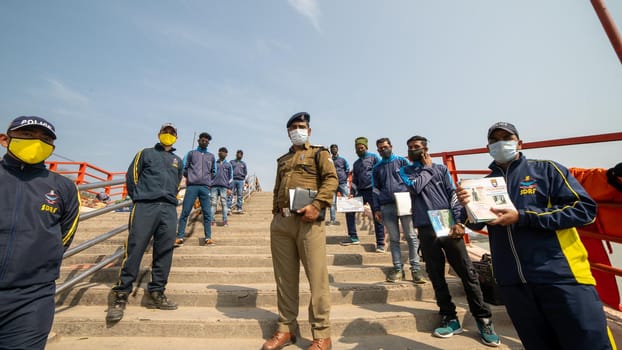 Haridwar, Uttarakhand India April 06, 2021. Policemen spreading awareness of protection from Coronavirus to stay safe from Coronavirus during Maha Kumbh 2021. Apple prores 422 High-quality 4k footage.