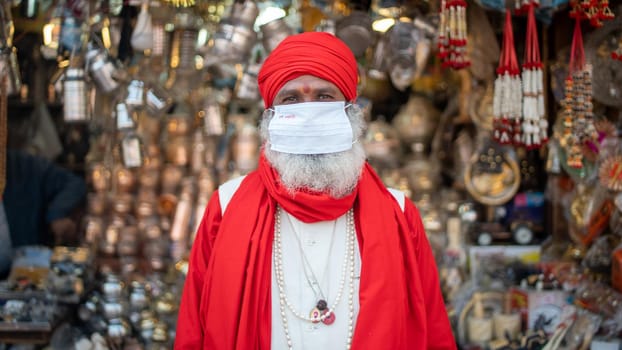 Haridwar, Uttarakhand.India- March 05 2021- Indian saints at largest gathering festival Kumbh mela at Haridwar, Uttarakhand, India, wearing Coronavirus protection mask, Appleprores422 4k Cinetone High quality 4k footage