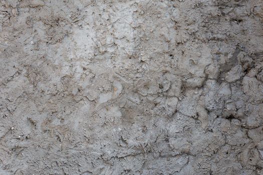 rough and bumpy cement industrial wall - flat texture and background.
