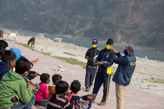 Haridwar, Uttarakhand India April 06, 2021. Policemen spreading awareness of protection from Coronavirus to stay safe from Coronavirus during Maha Kumbh 2021. Apple prores 422 High-quality 4k footage.