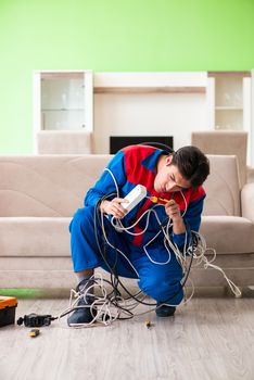Electrician contractor with tangled cables