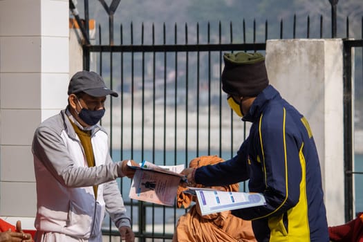 Haridwar, Uttarakhand India April 06, 2021. Policemen spreading awareness of protection from Coronavirus to stay safe from Coronavirus during Maha Kumbh 2021. Apple prores 422 High-quality 4k footage.