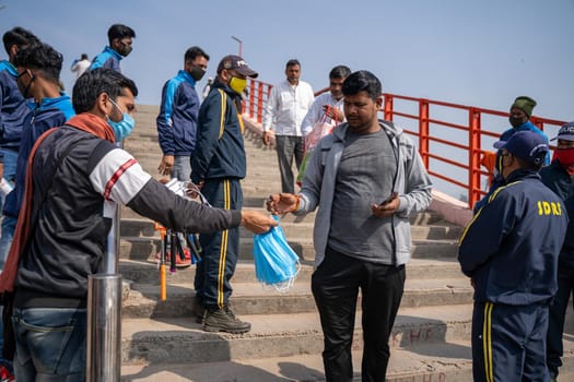 Haridwar, Uttarakhand India April 06, 2021. Policemen spreading awareness of protection from Coronavirus to stay safe from Coronavirus during Maha Kumbh 2021. Apple prores 422 High-quality 4k footage.