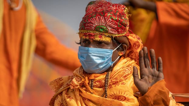 Haridwar, Uttarakhand.India- March 05 2021- Indian saints at largest gathering festival Kumbh mela at Haridwar, Uttarakhand, India, wearing Coronavirus protection mask, Appleprores422 4k Cinetone High quality 4k footage