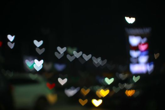 rainbow and blur heart shape love valentine day colorful night light on street