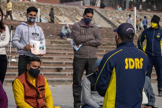 Haridwar, Uttarakhand India April 06, 2021. Policemen spreading awareness of protection from Coronavirus to stay safe from Coronavirus during Maha Kumbh 2021. Apple prores 422 High-quality 4k footage.