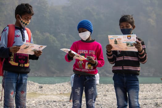 Haridwar, Uttarakhand India April 06, 2021. Policemen spreading awareness of protection from Coronavirus to stay safe from Coronavirus during Maha Kumbh 2021. Apple prores 422 High-quality 4k footage.