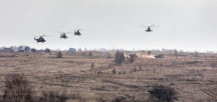 ZHYTOMYR Reg, UKRAINE - Nov. 21, 2018: Combat training at the training center of the airborne troops of the Ukrainian Armed Forces in Zhytomyr region. Helicopters during combat missions