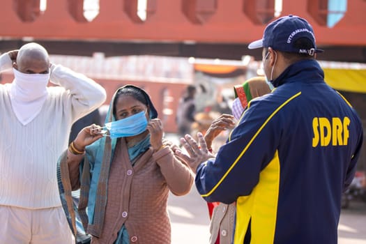 Haridwar, Uttarakhand India April 06, 2021. Policemen spreading awareness of protection from Coronavirus to stay safe from Coronavirus during Maha Kumbh 2021. Apple prores 422 High-quality 4k footage.