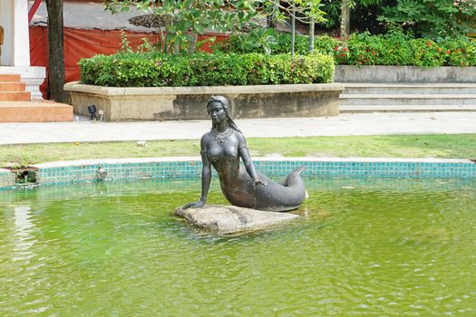 Rayong, Thailand - April 13, 2021: Mermaid is main character in The famous Thai poet Phra Aphai Mani at Phra Sunthonwohan park in Rayong, Thailand