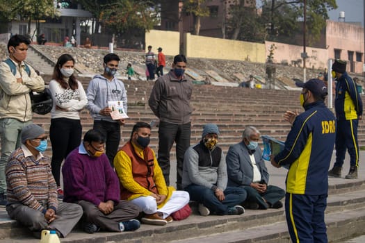 Haridwar, Uttarakhand India April 06, 2021. Policemen spreading awareness of protection from Coronavirus to stay safe from Coronavirus during Maha Kumbh 2021. Apple prores 422 High-quality 4k footage.