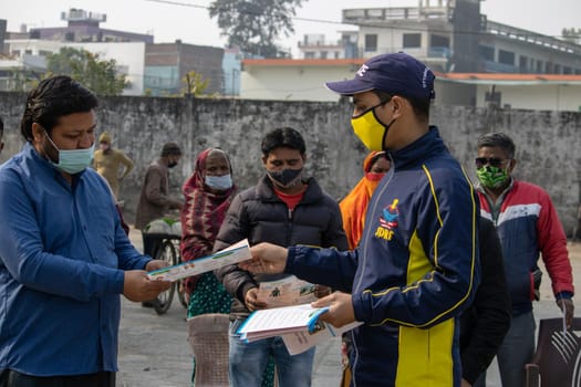 Haridwar, Uttarakhand India April 06, 2021. Policemen spreading awareness of protection from Coronavirus to stay safe from Coronavirus during Maha Kumbh 2021. Apple prores 422 High-quality 4k footage.