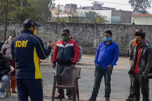 Haridwar, Uttarakhand India April 06, 2021. Policemen spreading awareness of protection from Coronavirus to stay safe from Coronavirus during Maha Kumbh 2021. Apple prores 422 High-quality 4k footage.