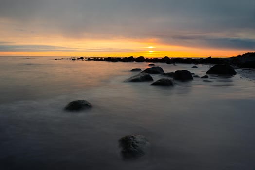 Long exposure of sunset at beach south of Stavanger, Norway