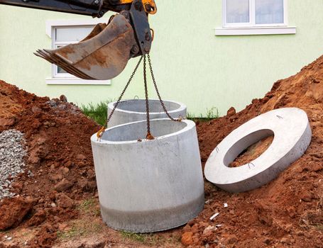 Installation of underground tank for sewage system