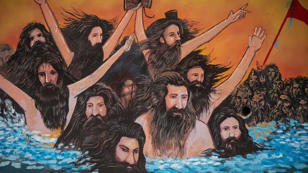 Painting of Indian Hindu religious saint at Holy city of Haridwar during largest festival of India Kumbh Mela 2021. High quality photo