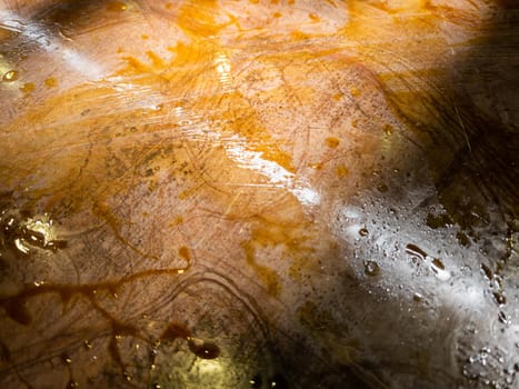 oiled burnt brown steel sheet full frame close-up industrial background