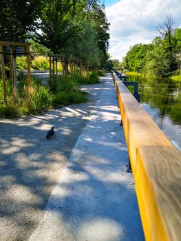 Platform with benches as relaxing area on Olawa river