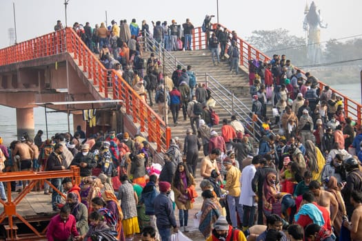 Haridwar, Uttarakhand, India, April 14, 2021. Pilgrims Holy dip in river Ganges, The Home of Pilgrims in India, Kumbh Nagri Haridwar Uttarakhand India.Religious Nagri Haridwar, The Highly visited pilgrimage place in India. City of Holy River Ganga. High quality photo