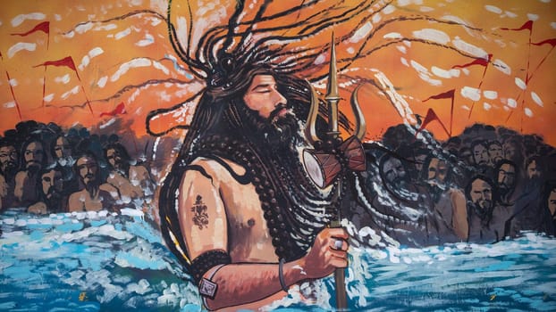 Painting of Indian Hindu religious saint at Holy city of Haridwar during largest festival of India Kumbh Mela 2021. High quality photo