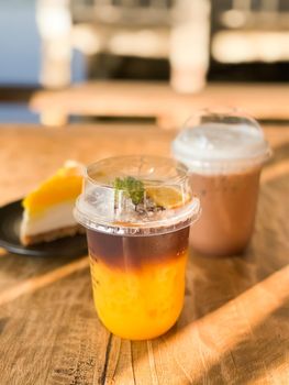 A glass of iced americano with orange juice, stock photo