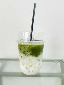 A glass of iced Thai milk tea, stock photo