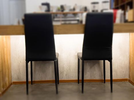 Black chairs decorated in coffee shop, stock photo