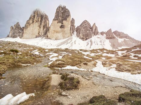 Evenning spring  panorama view from popular trail. Sharp peaks  Tre Cime di Lavaredo (Drei Zinnen ), Sextener Dolomiten mountains,  Italien Alps