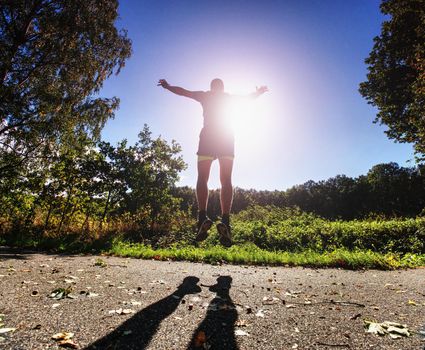 Man is training, prepare his body for marathon run. Marathon popular sport challenge to improve yourself. 