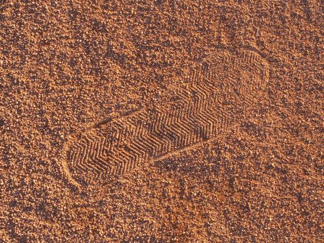 Tennis court with foot marks in antuka wait for service.  Empty tennis court after match.
