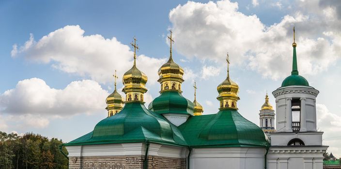 Churches and golden domes in Kyiv, Ukraine. Orthodox Christian Cathedral with golden domes and crosses. Church of the Savior on Berestov, Kiev-Pechersk Lavra. 