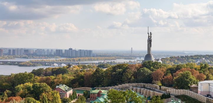 Aerial view on Kyiv city, Dnipro River, Motherland Monument and Kyiv Pechersk Lavra.