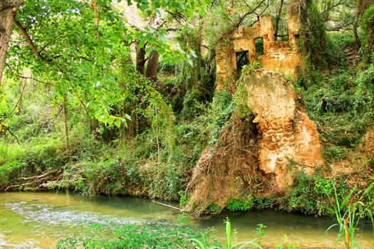 Abandoned old house by the river in Chelva, Valencia, Spain