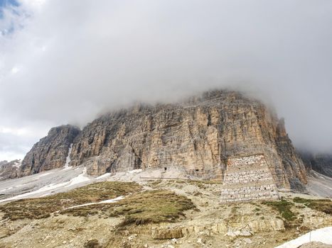 Asphalt road to parking place for motorhomes in National Nature Park Tre Cime In the Dolomites Alps, Italy.