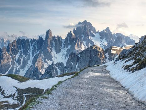 Alps - popular mountains in Europe.  Ridge in early summer scenery.