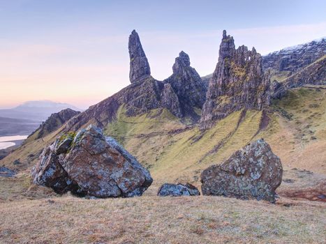 Famous view over Old Man of Storr in Scotland. Popular exposed rocky tower.