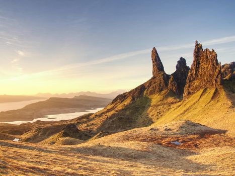 Famous view over Old Man of Storr in Scotland. Popular exposed rocky tower.