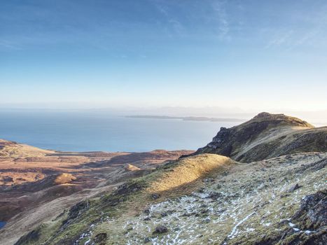 Highland Region Scotland United Kingdom , purople daybreak above sea at horizon