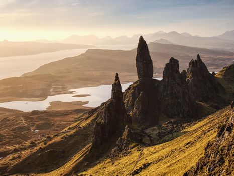 Sunrise at The Old Man of Storr - amazing scenery with vivid colors. Symbolic tourist attraction.  Scottish highlands in February morning