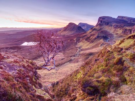 Landscape view of Quiraing mountains on Isle of Skye, Scottland. Sunny winter middaywith clear sky