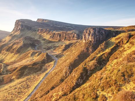 Sunny morning in Quiraing mountains. Hilly landscape of Isle of Skye, Scottish Highlands. Breathtaking view